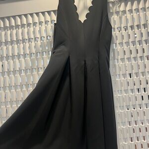 Black size 2, dress with pockets. Great fabric!
